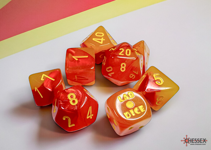 Chessex - Gemini Polyhedral Gellow -Red/yellow Luminary 7-Die Set (with bonus die)